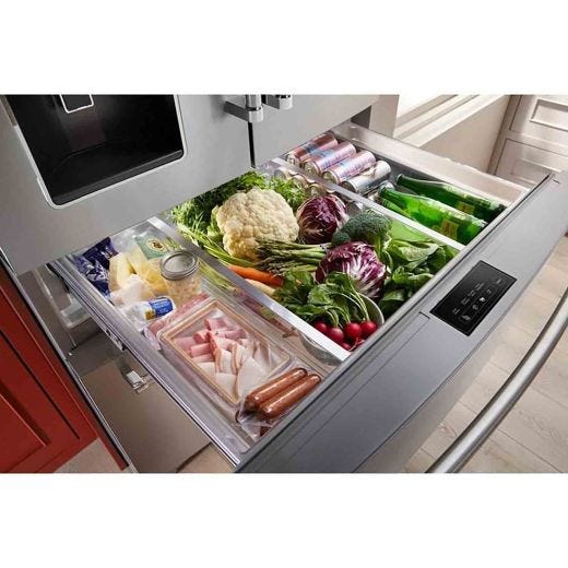 Réfrigérateur 4 portes 36" avec distributeur eau et glace